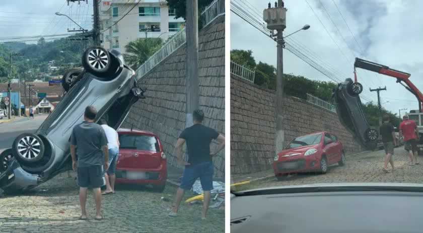 Motorista esquece freio de mão em SC, carro fica de pé e até guindaste precisa ser chamado